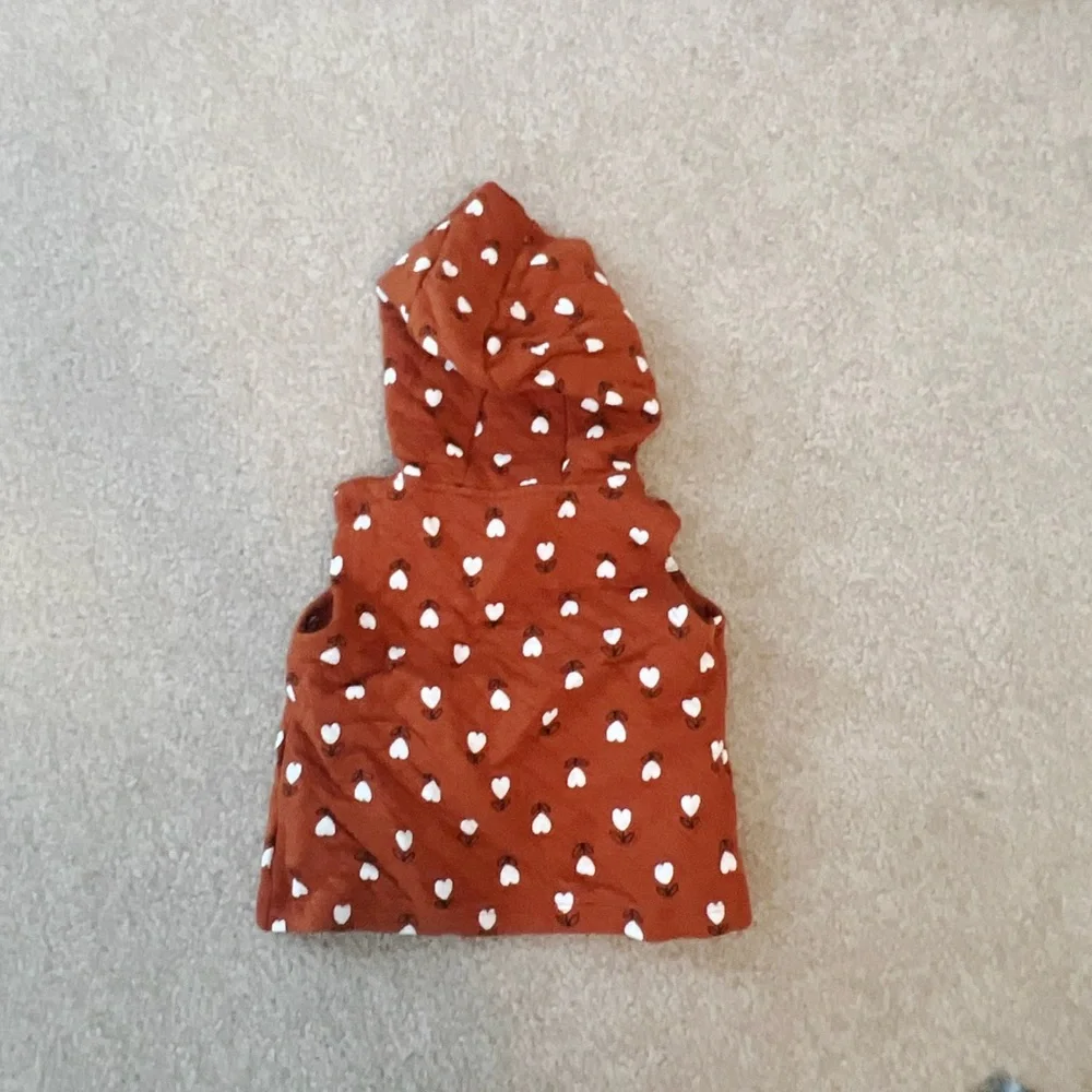 Carter’s Baby Girl Orange zip up hooded vest with hearts
